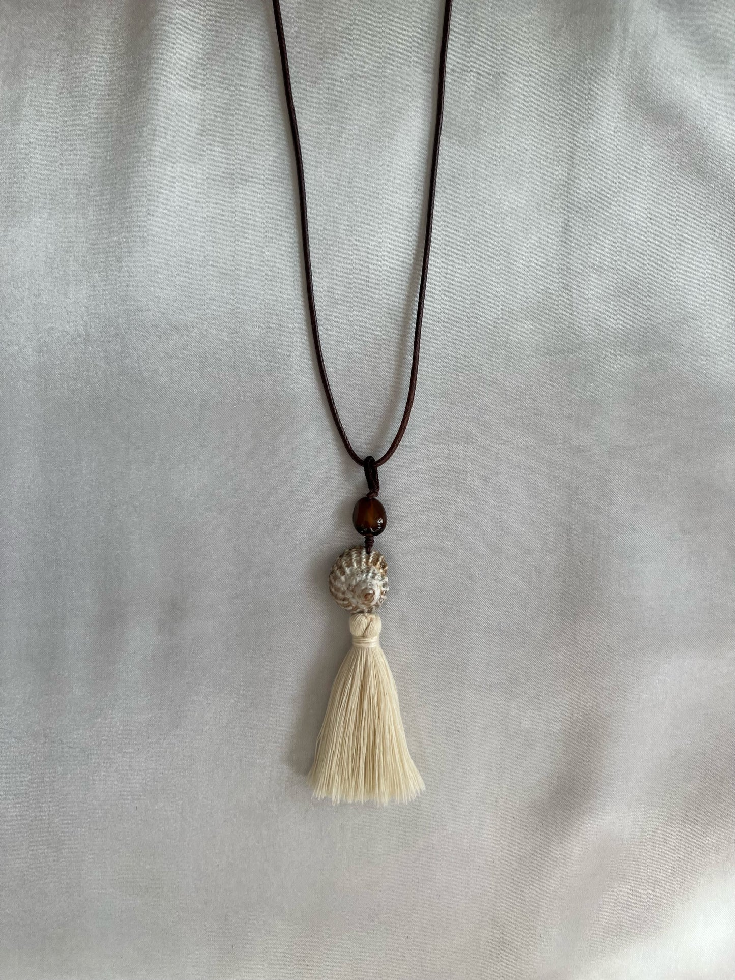 TURBAN SHELL TASSEL NECKLACE