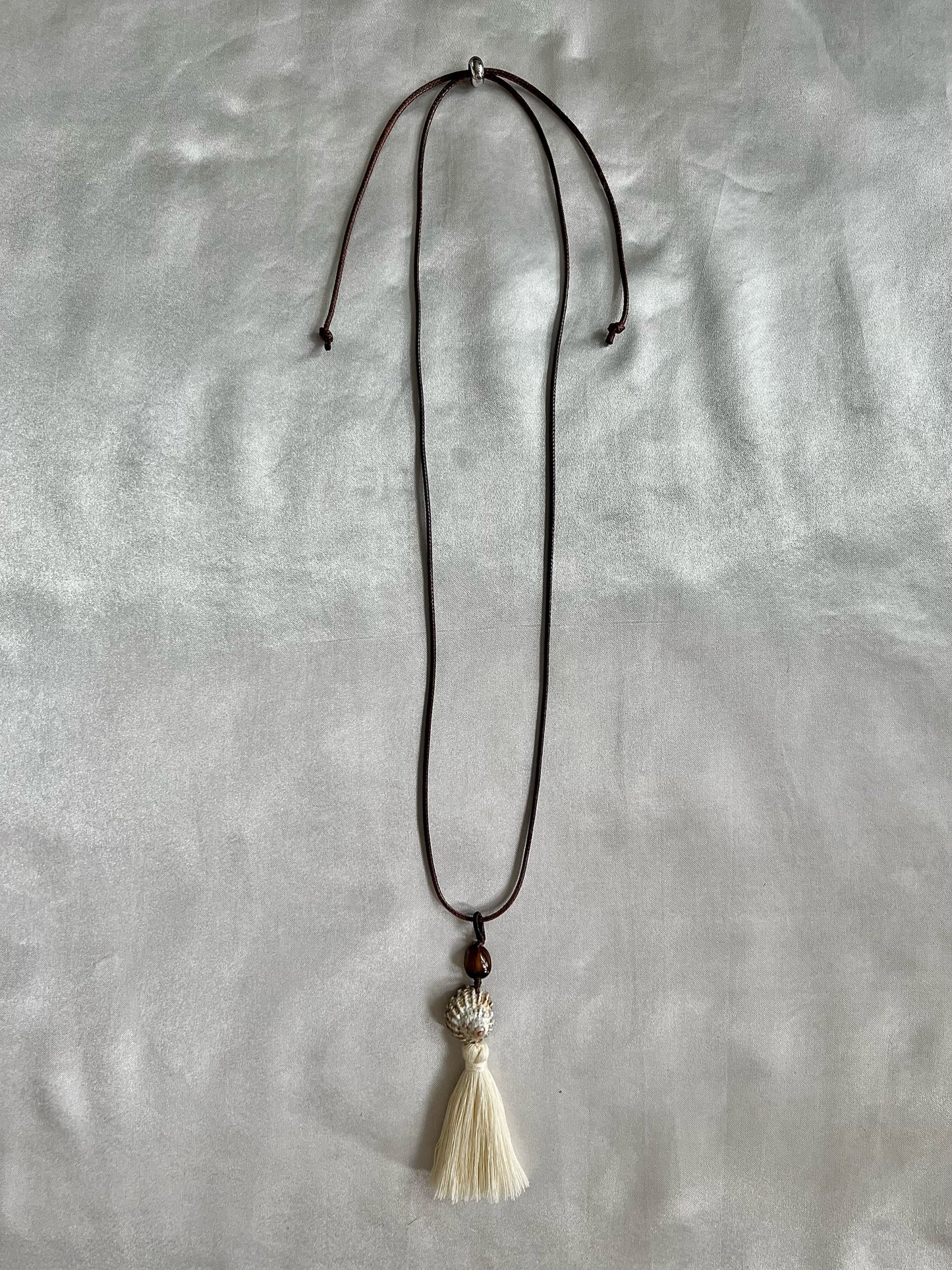 TURBAN SHELL TASSEL NECKLACE
